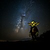 A devious goblin staring up at the stars