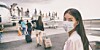 queue of passengers board plane