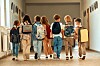 Generic shot of some kids walking down a corridor at school