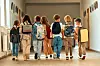 Generic shot of some kids walking down a corridor at school