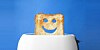 Toaster with smiley toast