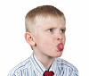 Boy sticking tongue out