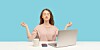 Calm woman using computer