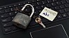 abc password on a postit on a keyboard - conceptual illustration for poor security