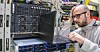 Someone despairing at their servers not working in a datacenter