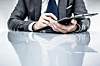 Business suited man with clipboard