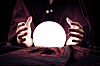 Someone peering at a crystal ball