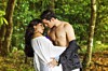 Couple kissing - shirtless man with woman - 'romance novel cover' style. Photo by shutterstock