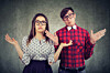 couple shrugging