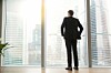 Businessman looking out window