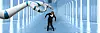 Illustration of a robot hand trying to flick away a White man in a business suit