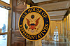 us_house_of_representatives_logo_on_door