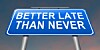 'Better Late Than Never' road sign