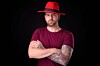 A dude wearing a red hat