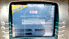 A rusty ticket terminal showing a Windows memory error