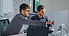 colleagues computer pointing micromanager