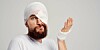 Bandaged man looks resigned