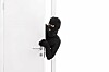 thief sneaking through door