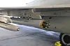 Close up of Advanced Precision Kill Weapon System (APKWS) rockets under the wing of an RAF Typhoon aircraft.