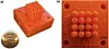 An image of a small 3D printed triaxial electrospray array