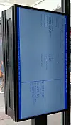 McDonald's touchscreen kiosk showing a blue BIOS setup utility screen indoors.