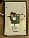 Raspberry Pi board attached to the back of a touchscreen display panel