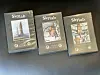 Three DVD cases documenting NASA's Skylab and its missions