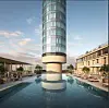 Image shows a rooftop swimming pool, with the BT Tower dominating the background
