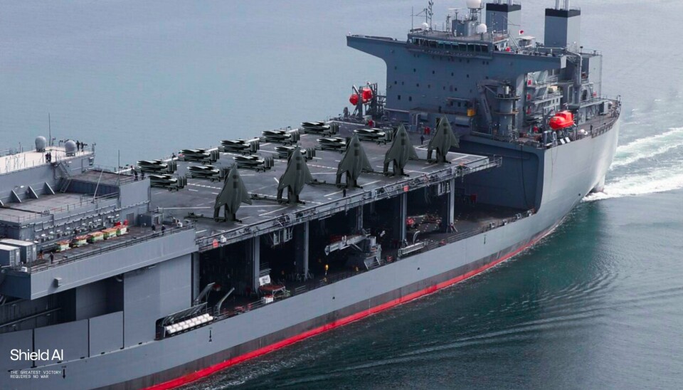 A mock-up image shows a US Navy Expeditionary Sea Base (ESB) ship carrying a number of X-BAT vertical take-off drones