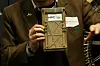 Mark Fernandez, HPE’s chief scientist of space tech and solutions, holds up the Spaceborne Computer 4 which will power the FLIP rover's AI and HPC experiments once it makes it to the moon.