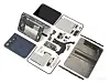 Disassembled smartphone with its casing, circuit boards, battery and internal parts arranged on a white background.
